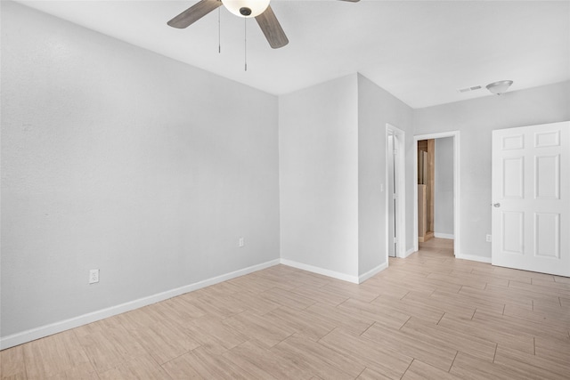 unfurnished room with ceiling fan