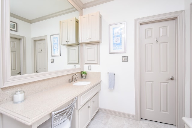 bathroom featuring vanity and crown molding