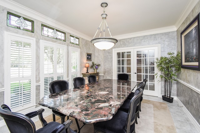 tiled dining space with french doors and ornamental molding