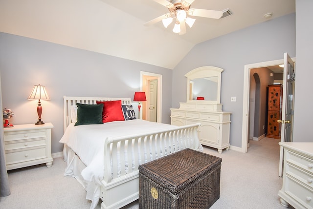 carpeted bedroom with lofted ceiling and ceiling fan