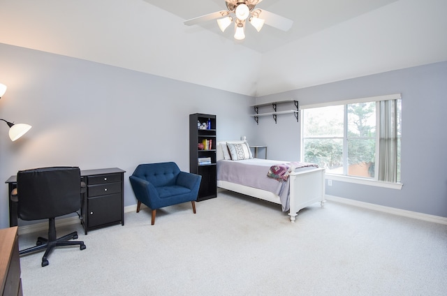 carpeted bedroom featuring lofted ceiling and ceiling fan