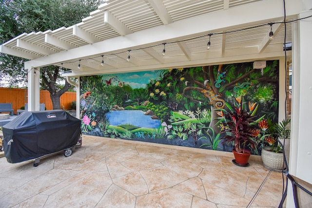 view of patio / terrace featuring a pergola and a grill