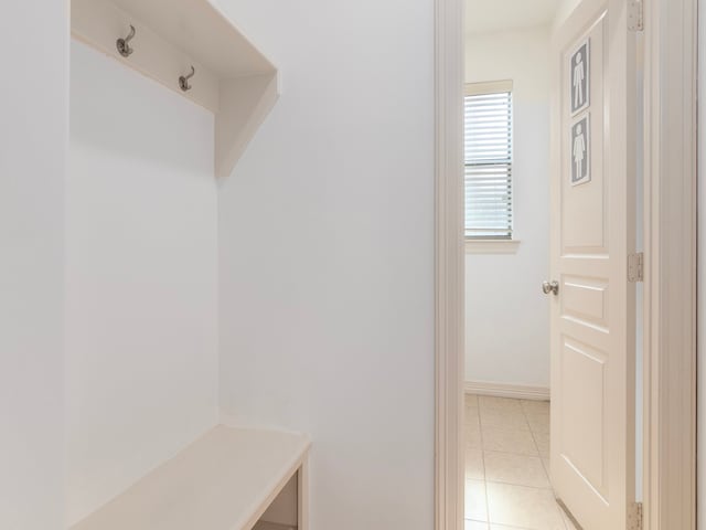 mudroom featuring light tile patterned flooring