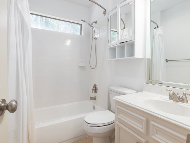 full bathroom featuring toilet, vanity, and shower / bath combination with curtain