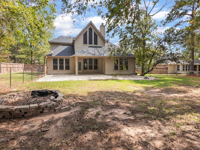 back of house featuring a patio area