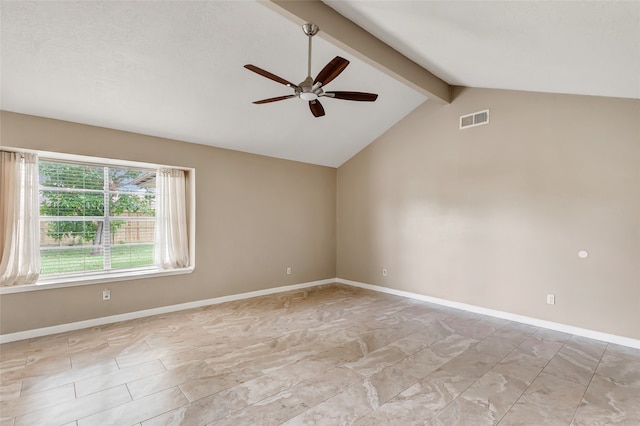 spare room featuring ceiling fan and vaulted ceiling with beams