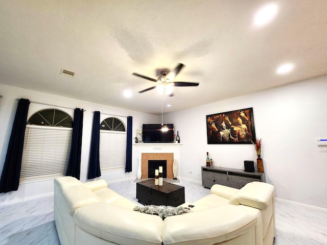 living room with ceiling fan