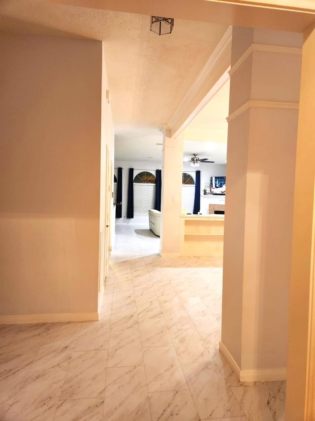 hallway featuring a textured ceiling