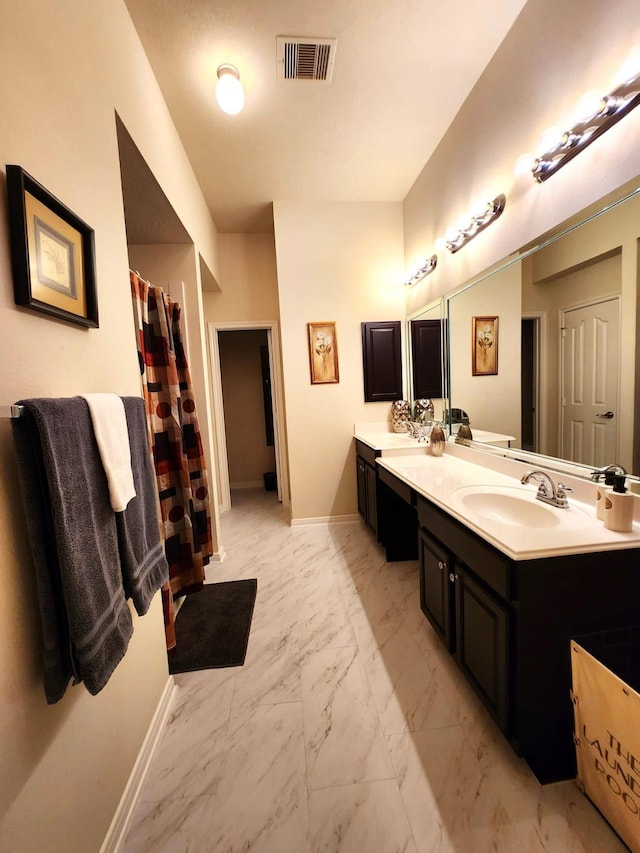 bathroom with vanity and walk in shower