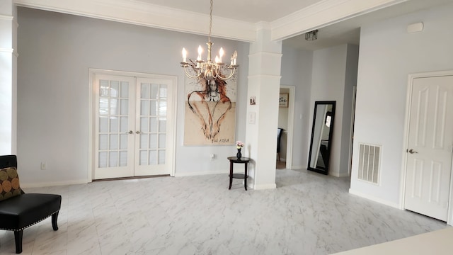 dining room featuring french doors, an inviting chandelier, and ornamental molding