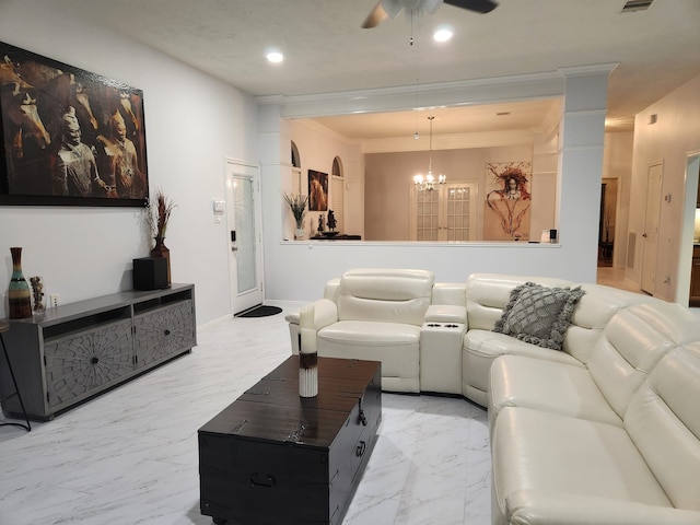 living room featuring ceiling fan with notable chandelier and ornamental molding