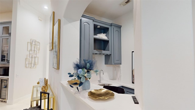 bathroom with visible vents and a sink