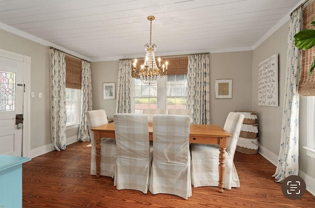 dining space with crown molding, dark wood-type flooring, and a notable chandelier