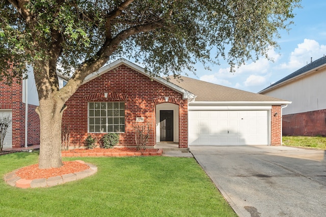 view of front of home featuring a garage and a front lawn