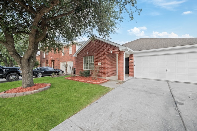 view of front facade with a garage and a front yard