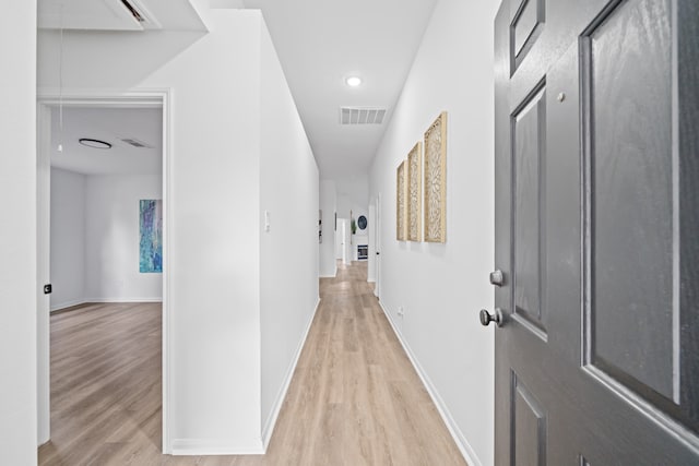 hall featuring light hardwood / wood-style floors