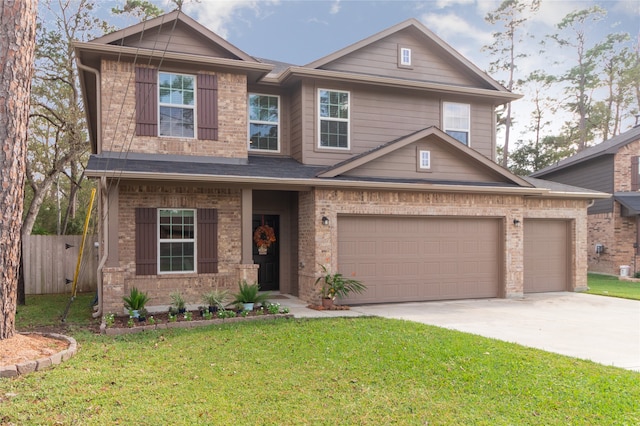 view of front facade featuring a garage and a front yard