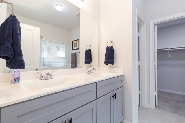 bathroom featuring vanity and tile patterned floors