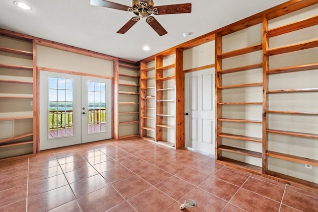 spare room with light tile patterned floors, french doors, a ceiling fan, and recessed lighting