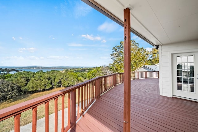 wooden terrace with a water view