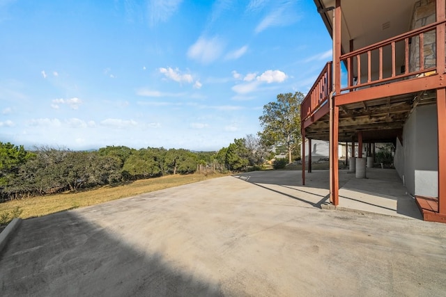 view of yard with a wooden deck