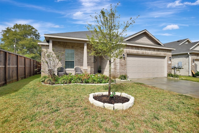 view of front of home featuring a garage and a front lawn