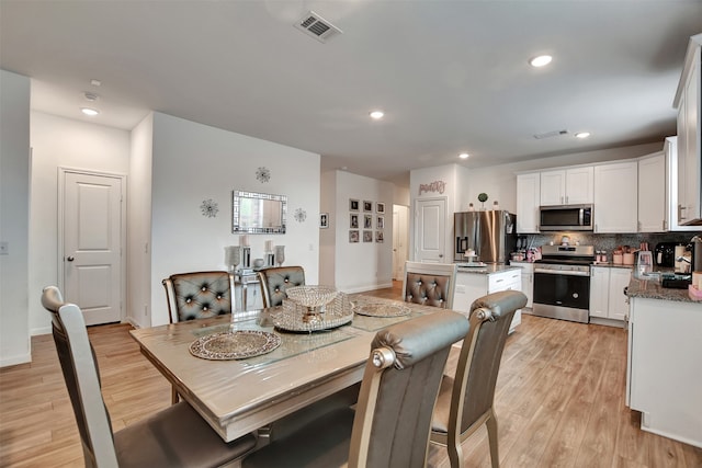 dining area featuring light hardwood / wood-style flooring