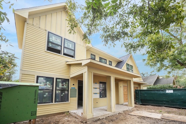 rear view of property featuring a patio