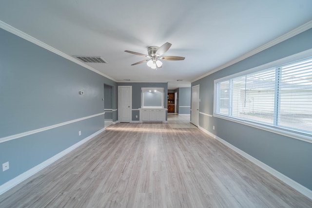 interior space featuring ceiling fan, light hardwood / wood-style floors, and ornamental molding