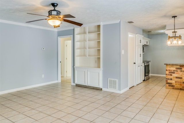 empty room featuring ceiling fan, light tile patterned flooring, a textured ceiling, and ornamental molding