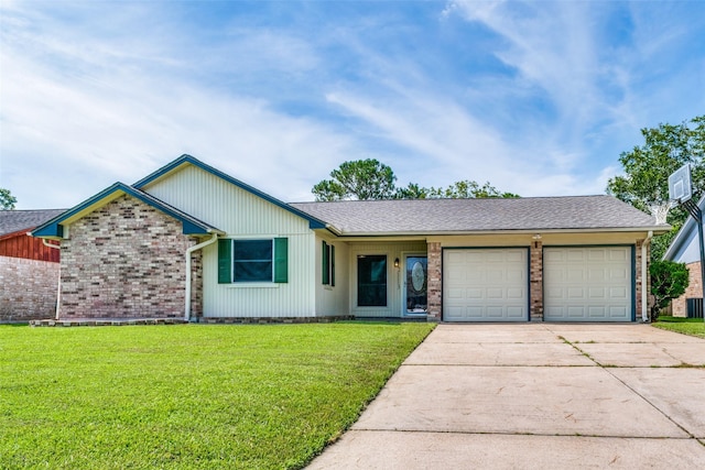 ranch-style home with a front yard and a garage