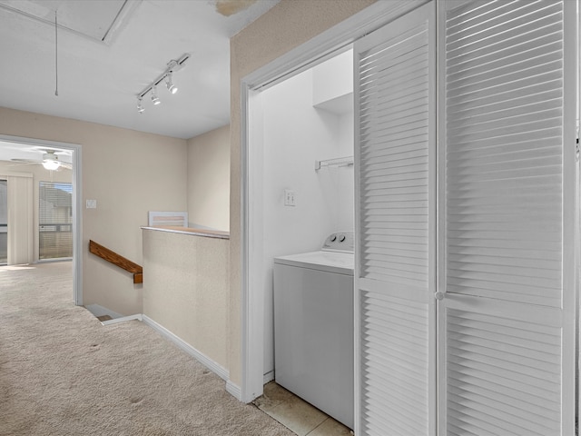 washroom with washer / clothes dryer, track lighting, light colored carpet, and ceiling fan