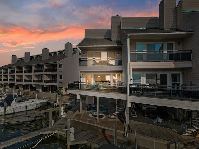 view of outdoor building at dusk