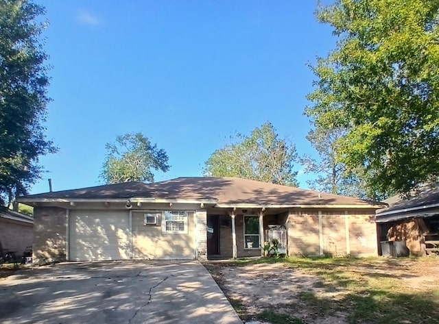 single story home featuring a garage