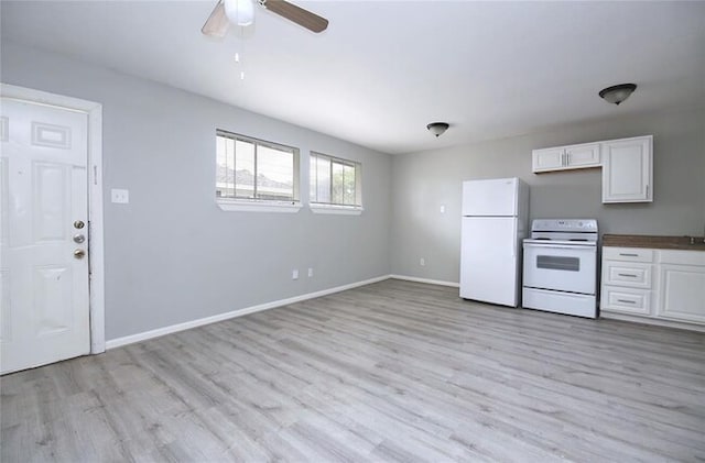 kitchen with white appliances, light hardwood / wood-style floors, white cabinetry, and ceiling fan