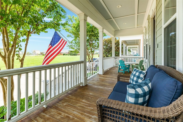 wooden terrace featuring a porch