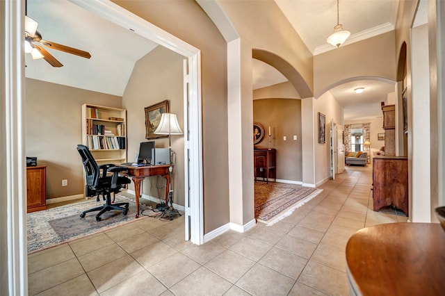 office with ceiling fan, crown molding, light tile patterned floors, and lofted ceiling