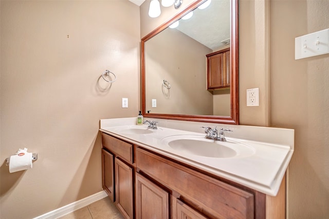 bathroom with vanity and tile patterned flooring