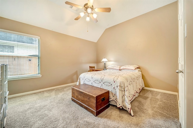 carpeted bedroom with lofted ceiling and ceiling fan