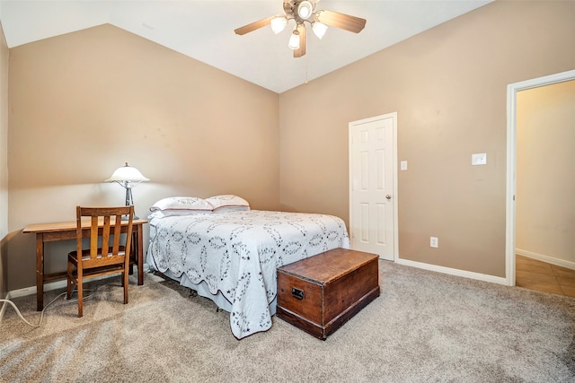 bedroom featuring vaulted ceiling, carpet flooring, and ceiling fan