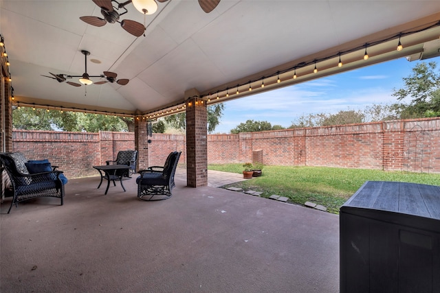 view of patio / terrace featuring ceiling fan