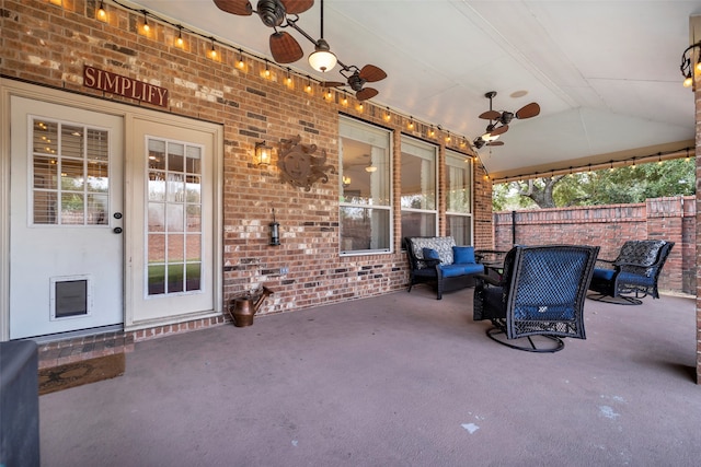 view of patio featuring ceiling fan and an outdoor living space