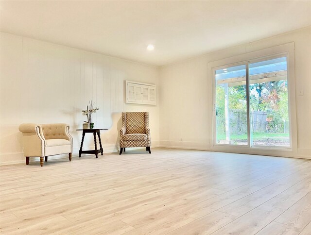 unfurnished room with light hardwood / wood-style floors