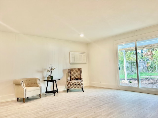 living area featuring light hardwood / wood-style floors