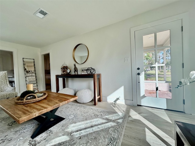 living area featuring light hardwood / wood-style floors