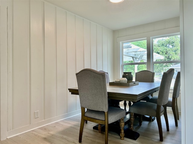 dining area featuring wood-type flooring