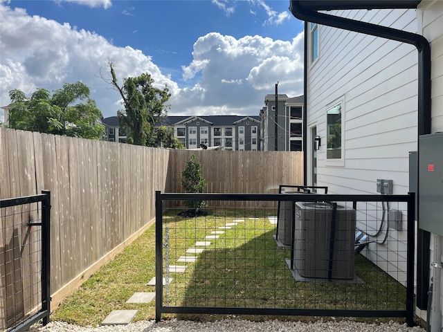 view of yard with central AC