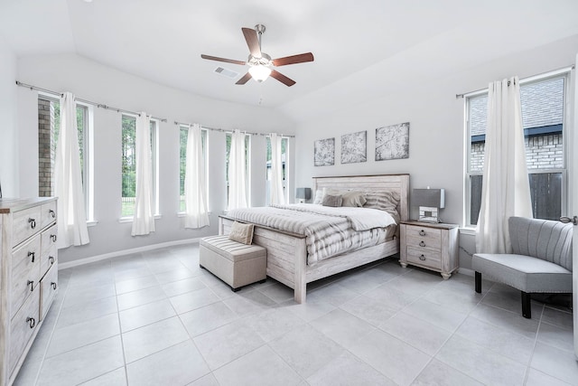 bedroom with light tile patterned flooring, lofted ceiling, and ceiling fan