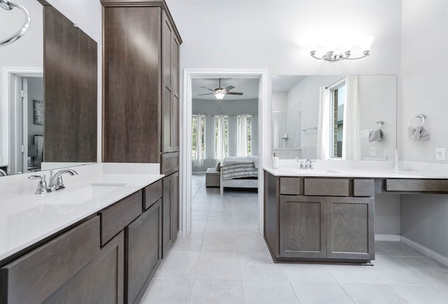 bathroom featuring vanity, ceiling fan, tile patterned flooring, and an enclosed shower