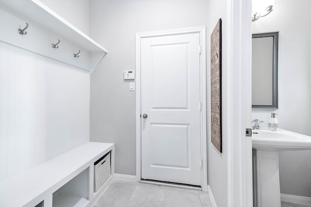 mudroom featuring light tile patterned flooring